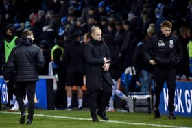 Shaun Maloney walks off after his side's defeat at Peterborough