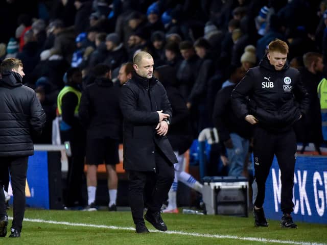 Shaun Maloney walks off after his side's defeat at Peterborough