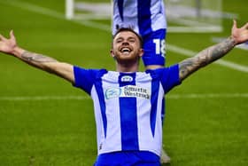 Dale Taylor celebrates his second goal against Shrewsbury - but there was to be a sting in the tale