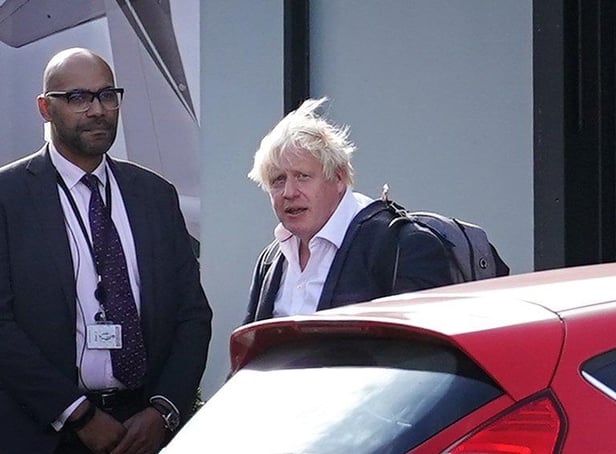 <p>Former Prime Minister Boris Johnson arrives at Gatwick Airport in London, after travelling on a flight from the Caribbean, following the resignation of Liz Truss as Prime Minister. Picture date: Saturday October 22, 2022.</p>