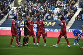 Chey Dunkley was sent off on his return to Wigan with Shrewsbury last year