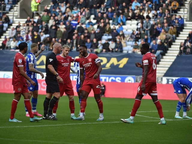 Chey Dunkley was sent off on his return to Wigan with Shrewsbury last year