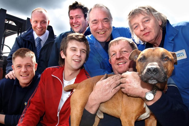 A 6 year old Staffordshire Bull Terrier called Tyke back with owner Tommy Shorrock and workers on the Bradley Hall Trading Estate, Standish, who were upset when he went missing for 3 months, Front, Johnny Ainsworth and Dan Foster, back, Steven Hughes, Matt Walsh, Terry Rainford and Norman Hardman. 
Tyke was popular with all the businesses on the trading estate when he used to pay his daily visit.  He was found in Skelmersdale and taken to Leigh dog kennels where he was recognised from his identity chip and reunited with owner Tommy who ran TA Vehicles in May 2006.