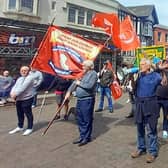 Trade unionists protest in Wigan town centre. Picture by Sue Vickers