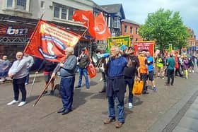 Trade unionists protest in Wigan town centre. Picture by Sue Vickers