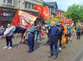 Trade unionists protest in Wigan town centre. Picture by Sue Vickers