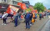 Trade unionists protest in Wigan town centre. Picture by Sue Vickers