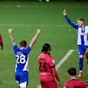 Owen Dale wheels away after scoring the second goal against Huddersfield