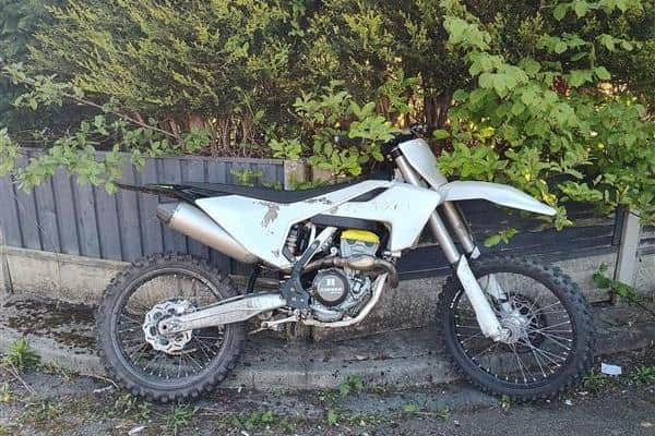 An off-road bike and a car have been seized by police in Wigan and one ...