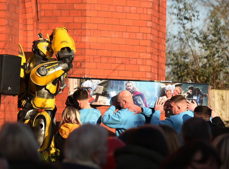 Bumblebee saluted as the coffin was carried into the church