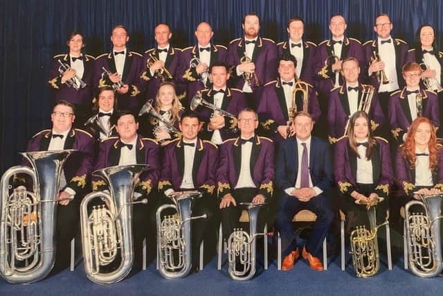 Members of The Pemberton Old Wigan DW Brass Band