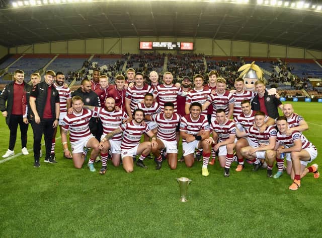 Wigan Warriors pose with the Locker Cup