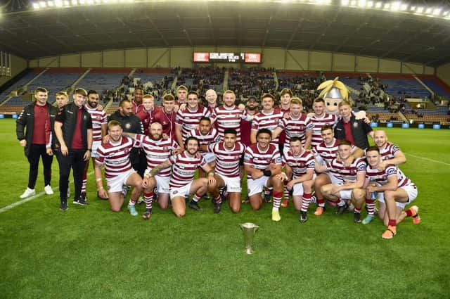Wigan Warriors pose with the Locker Cup
