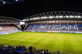Dean Riley is alleged to have run on the pitch at the Brick Community Stadium during the Wigan  and Bolton derby earlier this year
