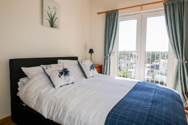 The spacious bedroom at 13 Palm View, Newquay. Available to book through Sykes Cottages.
