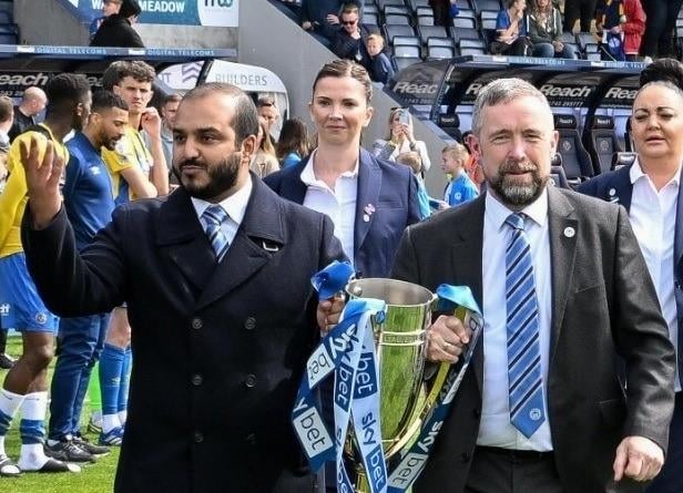 Talal Al Hammad and Mal Brannigan during happier times, with the League One title in 2022