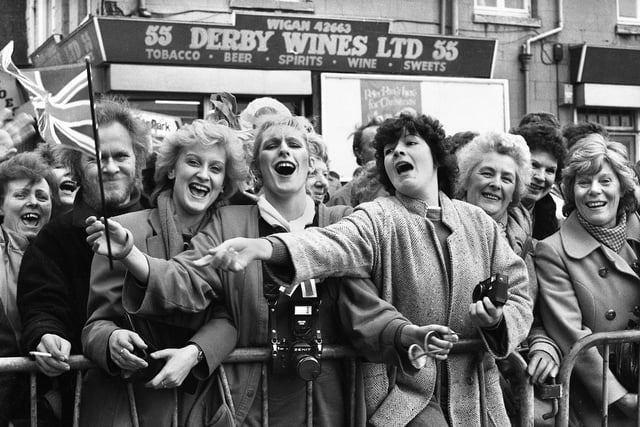 "God Save The Queen"....or words to that effect. The women of Wigan let rip with a little patriotic singing behind the crush barriers in Wallgate.