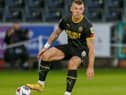 Max Power in action for Latics at Swansea