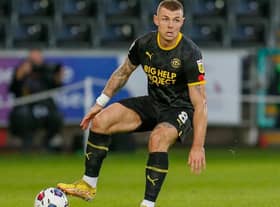 Max Power in action for Latics at Swansea
