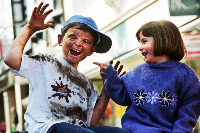 Robert Bolton, aged 7, from Standish was voted Wigan's grubbiest kid in February 2000.  He battled against 100 other mucky youngsters in a competition organised by Ariel Hygiene Antibac in association with BHS winning £150 worth of vouchers and going through to the national finals.  Robert's mum had sent in a photograph of him at his grubbiest which impressed the judges and his sister Sophie pictured here with him.