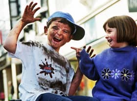 Robert Bolton, aged 7, from Standish was voted Wigan's grubbiest kid in February 2000.  He battled against 100 other mucky youngsters in a competition organised by Ariel Hygiene Antibac in association with BHS winning £150 worth of vouchers and going through to the national finals.  Robert's mum had sent in a photograph of him at his grubbiest which impressed the judges and his sister Sophie pictured here with him.