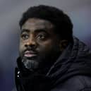 WIGAN, ENGLAND - JANUARY 17: Kolo Toure, Manager of Wigan Athletic, looks on prior to the Emirates FA Cup Third Round Replay match between Wigan Athletic and Luton Town at DW Stadium on January 17, 2023 in Wigan, England. (Photo by Alex Livesey/Getty Images)