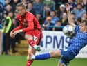 Thelo Aasgaard has given Latics a scare after damaging a shoulder during the closing stages at Brunton Park