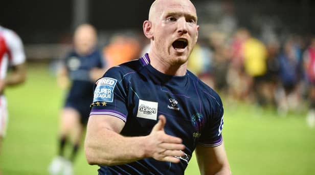 Liam Farrell celebrates scoring the winning try in golden point