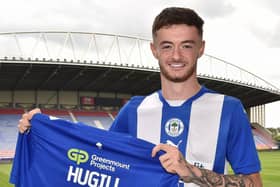 Joe Hugill shows off his new Latics No.9 shirt