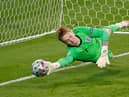 England's goalkeeper Jordan Pickford saves a penalty during the UEFA EURO 2020 final football match between Italy and England at the Wembley Stadium in London on July 11, 2021. (Photo by JOHN SIBLEY / POOL / AFP) (Photo by JOHN SIBLEY/POOL/AFP via Getty Images)