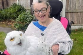 Tracy Mather, supported by Community Integrated Care in Wigan, meets a new feathered friend.