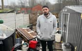 Craig Anderson surveys the aftermath of the flood which wiped out his stock of 2,500 rare fish