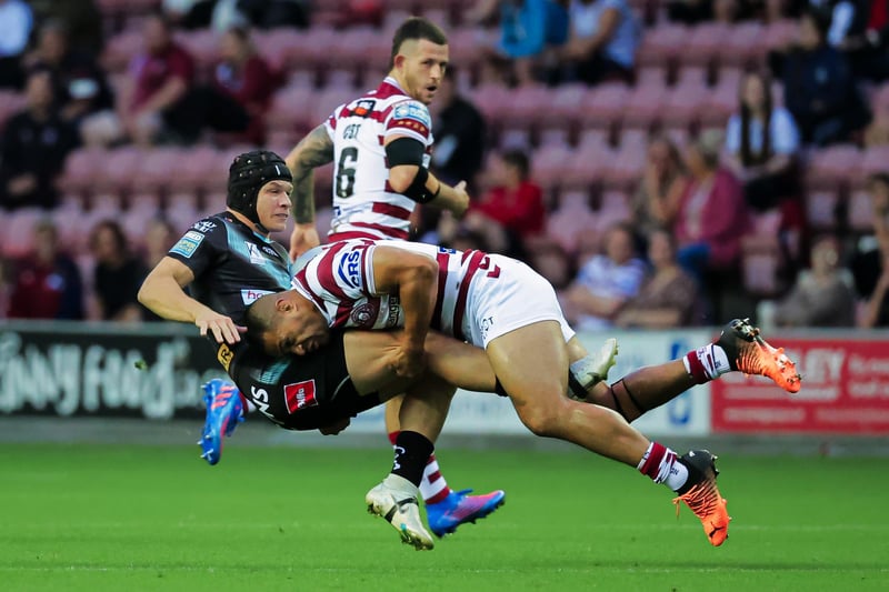 Willie Isa makes a strong tackle on Jonny Lomax.