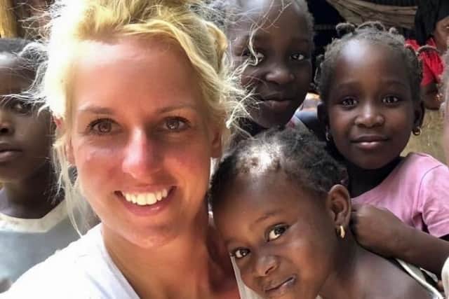 Teacher Kate Penarski with children in The Gambia