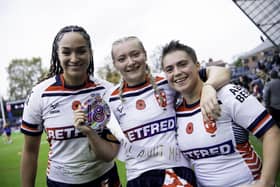 England's Amelia Brown (l) and Katie Mottershead (r) with Isabel Rowe as she celebrates her 18th birthday