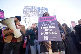 Members of the Royal College of Nursing (RCN) on the picket line outside St Thomas' Hospital, central London. Continued strike action plus winter pressures are jeopardising the ability of the NHS to break out of a "vicious cycle", a health leader has said. Issue date: Wednesday January 18, 2023.