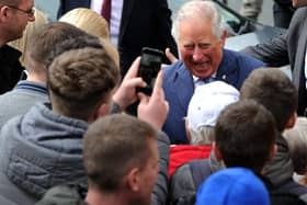 HRH Prince Charles visits the Wm Santus factory in Wigan, makers of the famous Uncle Joe's  Mintballs with John and Anthony Winnard. Children from St Andrew's Primary School wait for the Prince's arrival. Picture by Paul Heyes, Wednesday April 03, 2019.

























