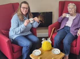 Anne Calland (right) visits B's Cafe at Belong Atherton for a chat with Admiral Nurse, Bridget Lawler (left)