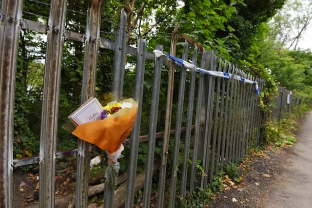 General view and flowers left at the scene where 16-year-old Jamie Lewin from Southport died, East Quarry, Appley Bridge.