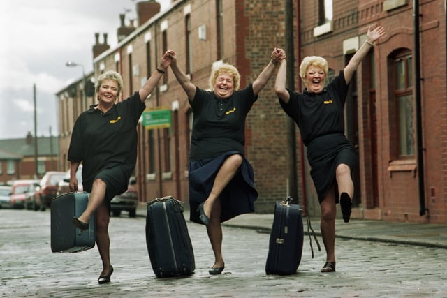 Ince ladies Liz Ramsdale, Enid Keates and Sylvia Armstrong about to take flight from Bird Street on an all-expenses paid trip of a lifetime to Las Vegas with number one chat show hostess Mrs. Merton in March 1997. They were flying over to the USA, with 50 other regular members of the TV show's audience, to support Mrs. Merton (aka comedienne Caroline Aherne) as she tried to break into the American comedy circuit.