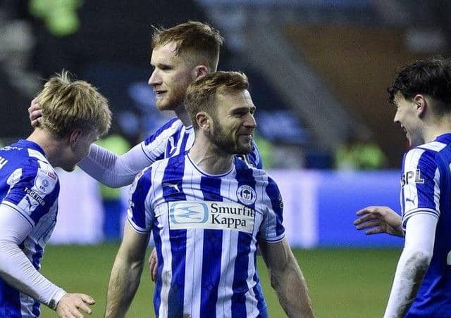 Callum McManaman leads the celebrations against Bolton in midweek