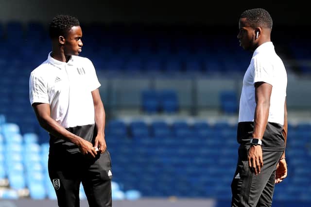 Steven and Ryan Sessegnon chew the fat before a game at Brighton in 2018