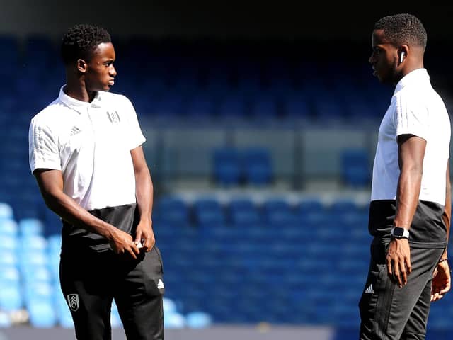 Steven and Ryan Sessegnon chew the fat before a game at Brighton in 2018