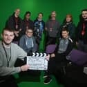 Coun Chris Ready with level three creative media production students in the studio at Wigan and Leigh College