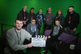 Coun Chris Ready with level three creative media production students in the studio at Wigan and Leigh College