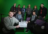 Coun Chris Ready with level three creative media production students in the studio at Wigan and Leigh College