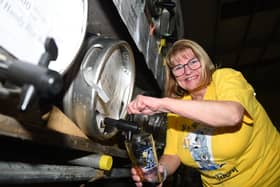 Sandra Cottam serves drinks at last year's festival