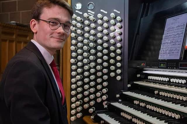 Alex Fisburn at the console of Liverpool Cathedral's grand organ - the biggest in the UK. It has been undergoing a £1.8m restoration and, when finished in just a few weeks' time, will have 11,000 pipes!