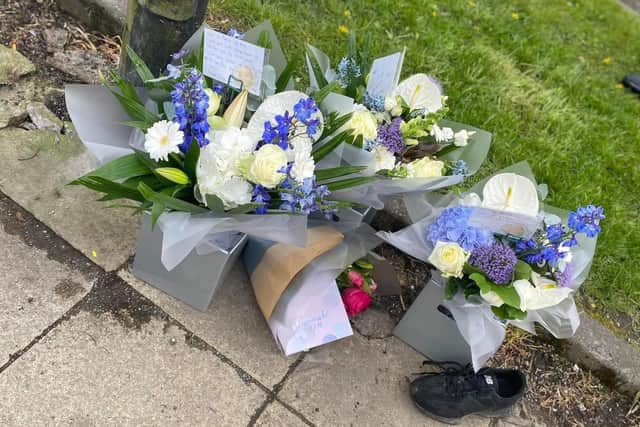 Flowers were left on Orrell Road, Orrell, following the collision