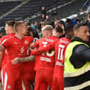 Tom Naylor celebrates his goal at MK Dons